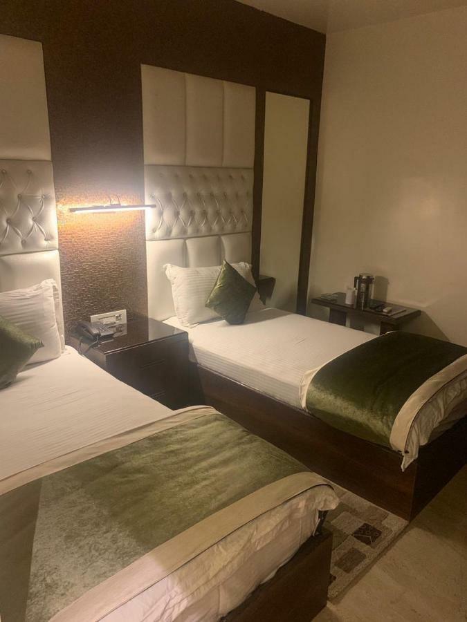 Hotel Mmk Kanpur Bagian luar foto